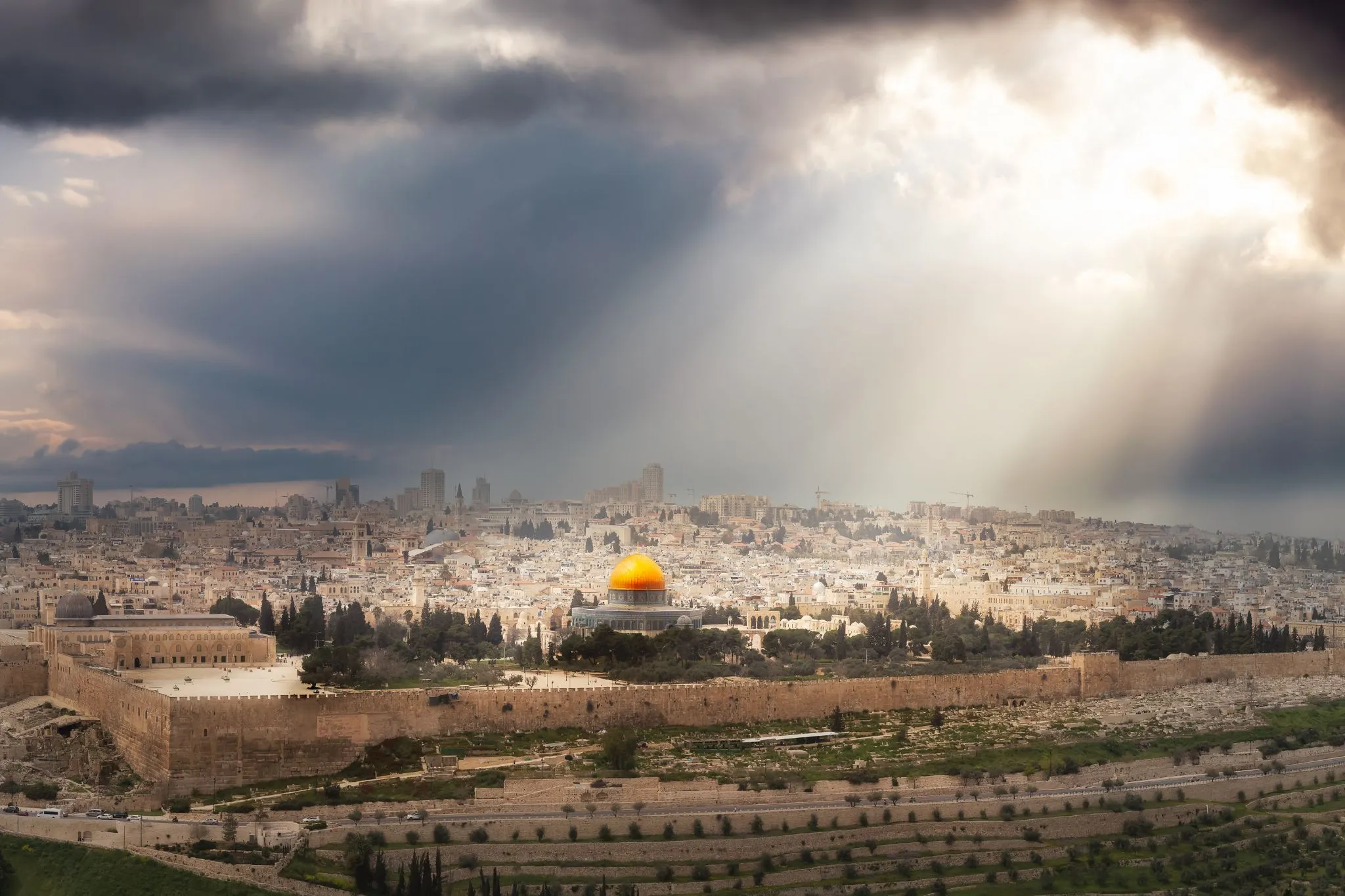 Aerial View of Jerusalem with Dramatic Sky Sunrays Composite